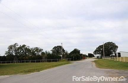 MAIN ENTRANCE : Gated entry off County Road
