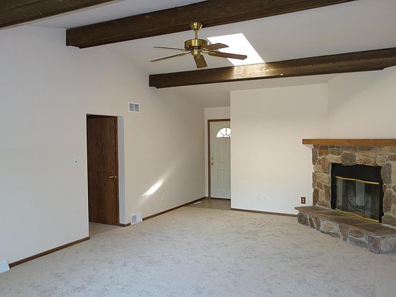 Front entry to great room, vaulted ceiling and skylight