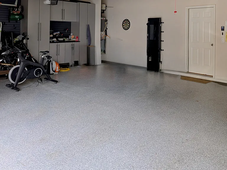3 Car Garage with Storage Cabinets