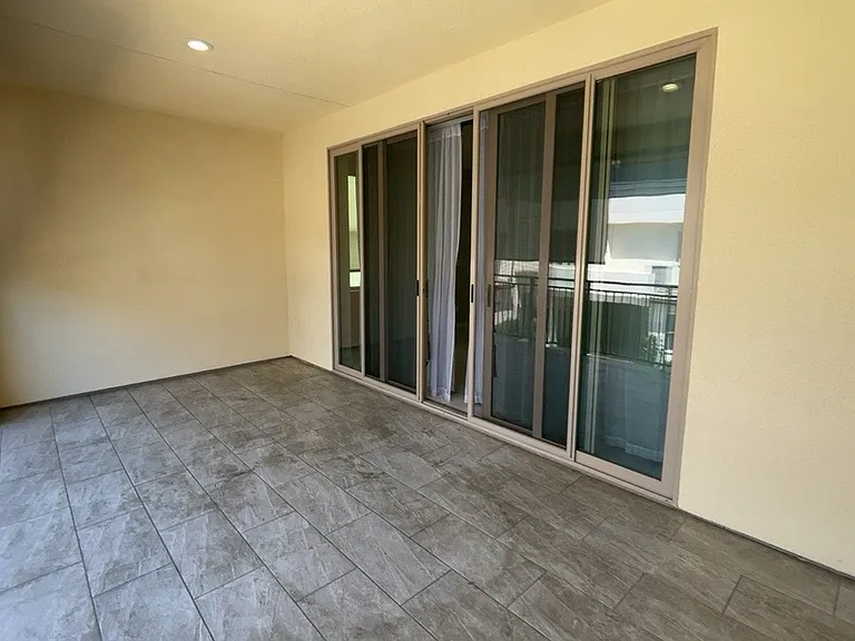2nd floor - Great room - Kitchen, living room, under-stair storage, bathroom, balcony/patio