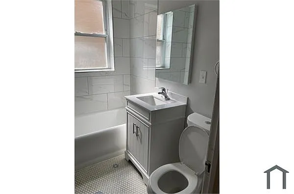 Building Photo - 7300 S Vernon Ave #1