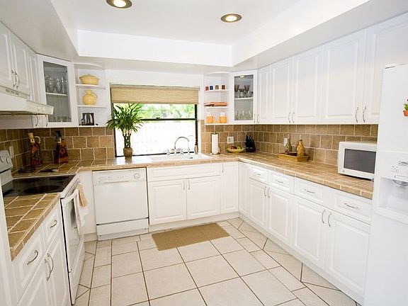 UPDATED KITCHEN WITH TILE COUNTERTOPS