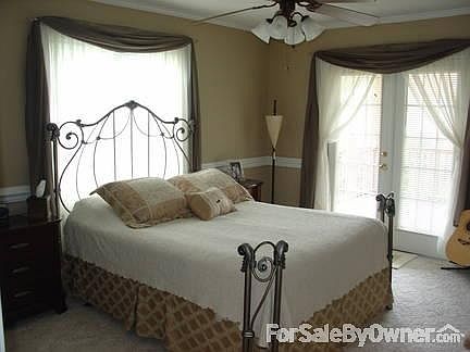 Master Bed Room
						:
						French doors to right leads to covered porch. Ceiling fan/recessed lighting.