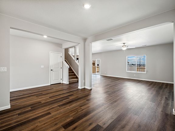 Formal dining room connected to the family room.