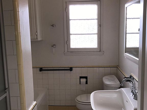 Bathroom with separate bathtub and separate shower.