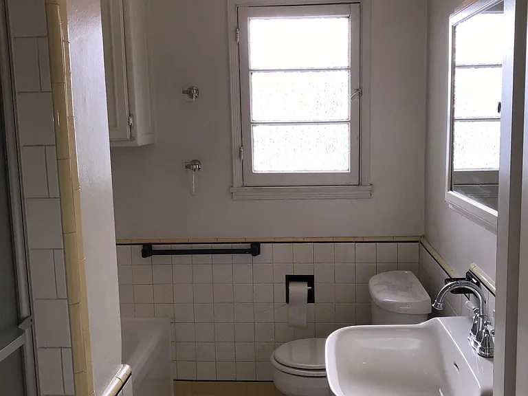 Bathroom with separate bathtub and separate shower.