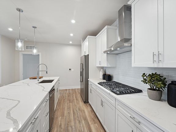 Gourmet Kitchen with Stainless Steel Appliances - Model Representation