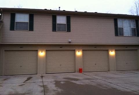 ATTACHED 1 CAR GARAGE AND CEMENT SKIRT FOR AUTOS