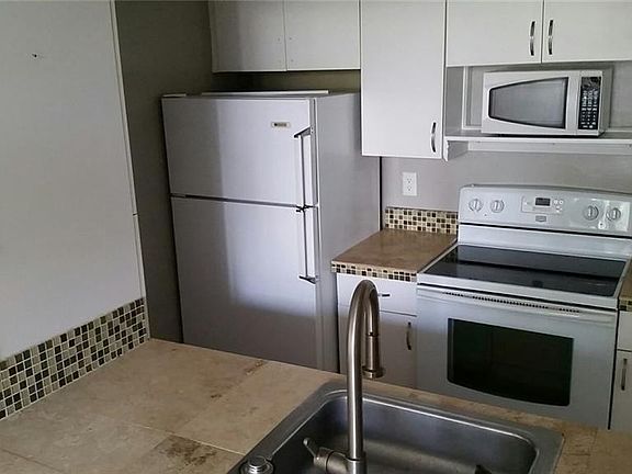 2nd image of 5897 Windhover Dr #11