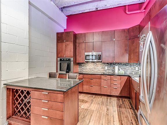 Another view of the upgraded kitchen - notice the convenient wine rack.