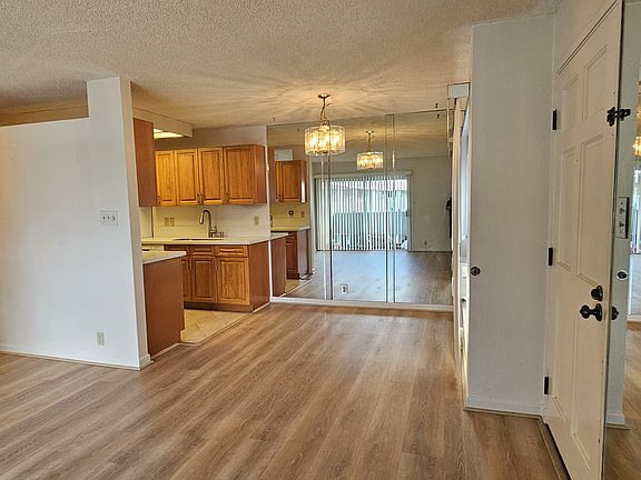 Dining area with mirrored wall.