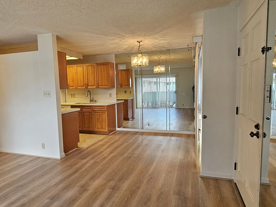 Dining area with mirrored wall.