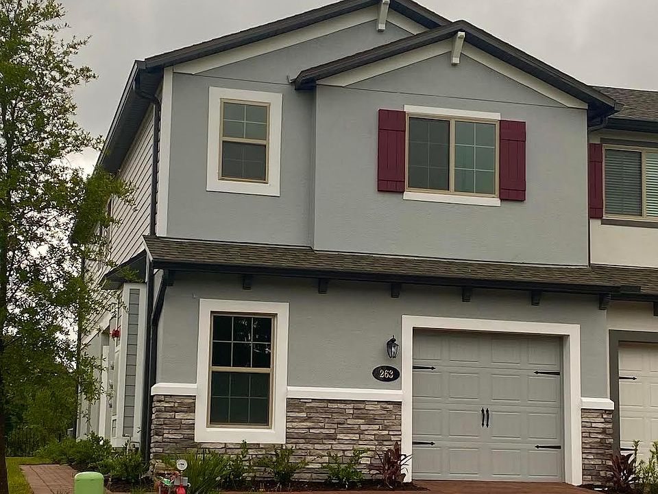 Exterior of house with 2 car driveway (corner unit with more yard space)