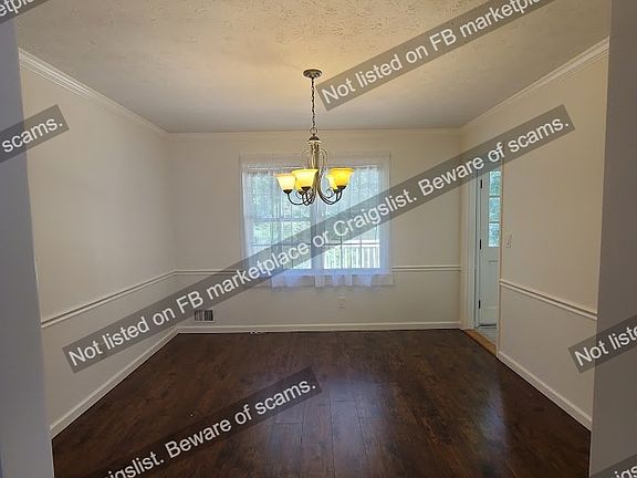 Dining room. Overlooks backyard and is adjacent to the living room and kitchen.