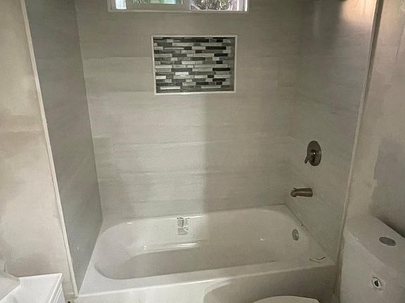 Brand new bathroom. New everything with beautiful tile.