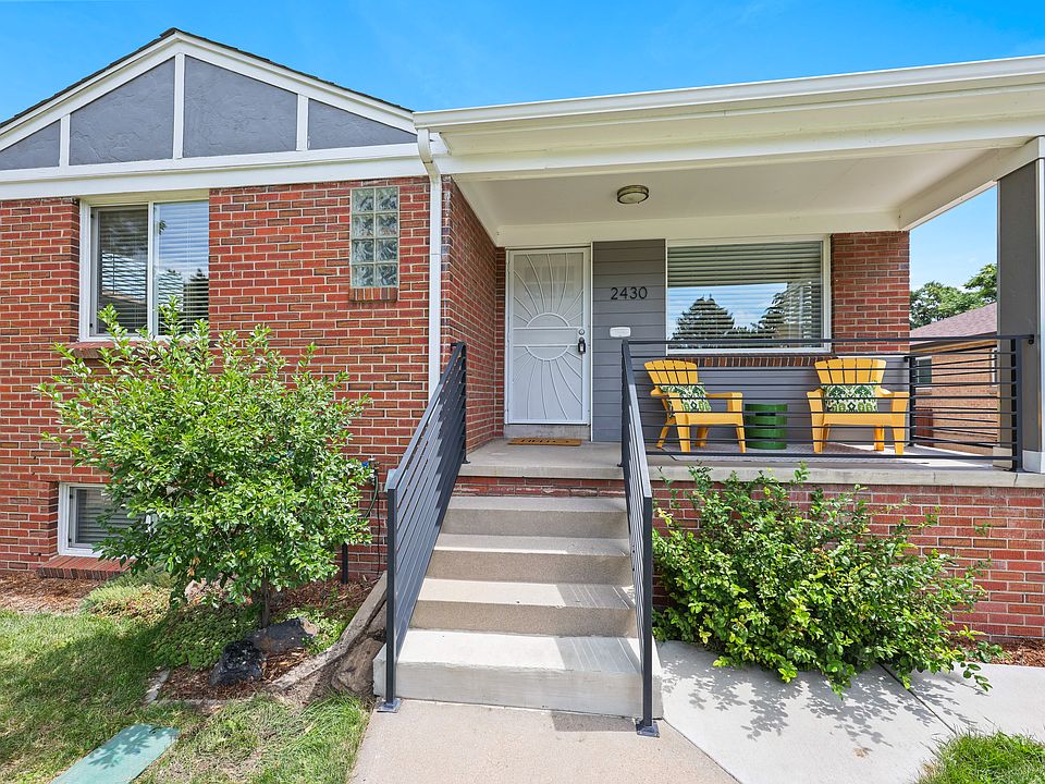 FRONT OF HOME AND ENTRANCE TO MAIN LEVEL