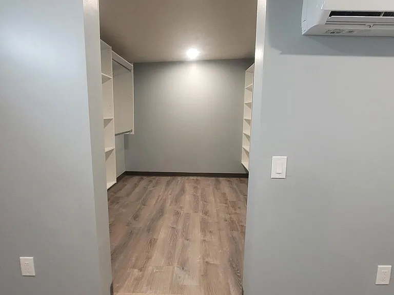 Bedroom 1 entrance to walk-in closet