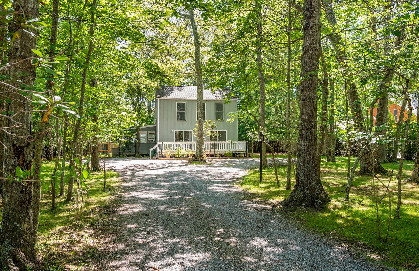  Set back deep off of the road on a beautiful lot