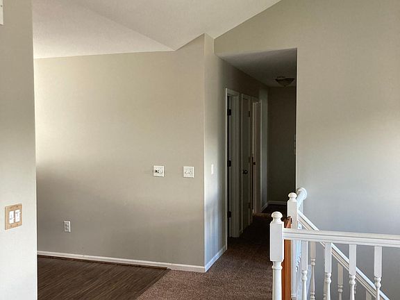 View from living room; entryway (right) and dining/kitchen (left)