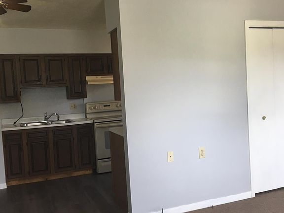 Kitchen with laundry hookup.