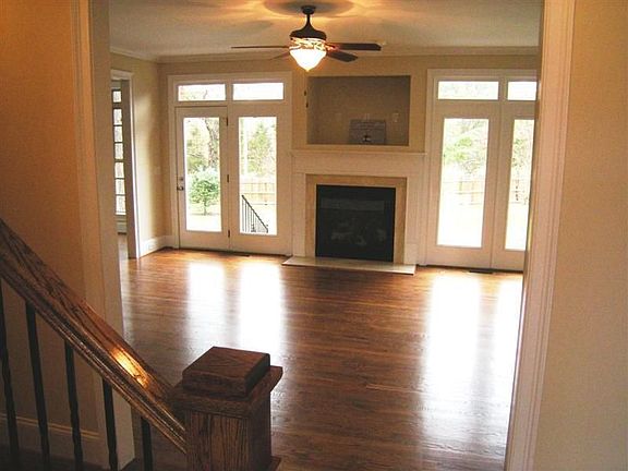 The greatroom has gorgeous hardwood floors