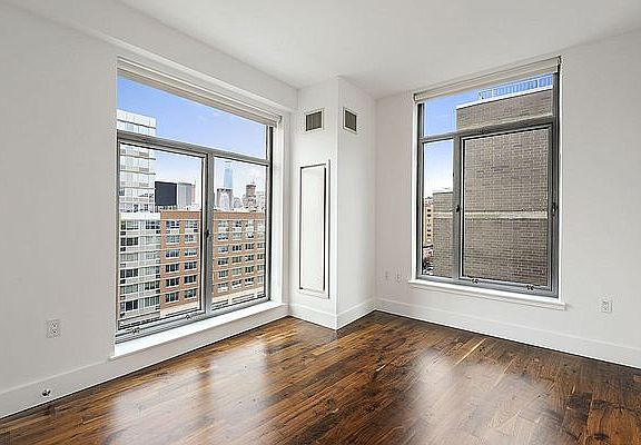 3rd image of 21 E 1st St APT 1102