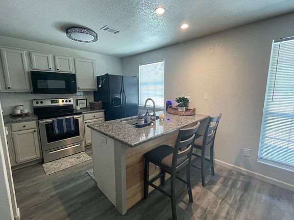 4th image of 6916 Sunnybank Dr