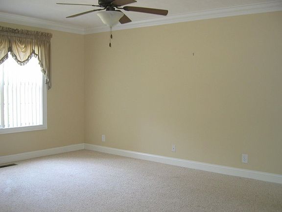 Neutral Colors & Crown Molding in the Living Room