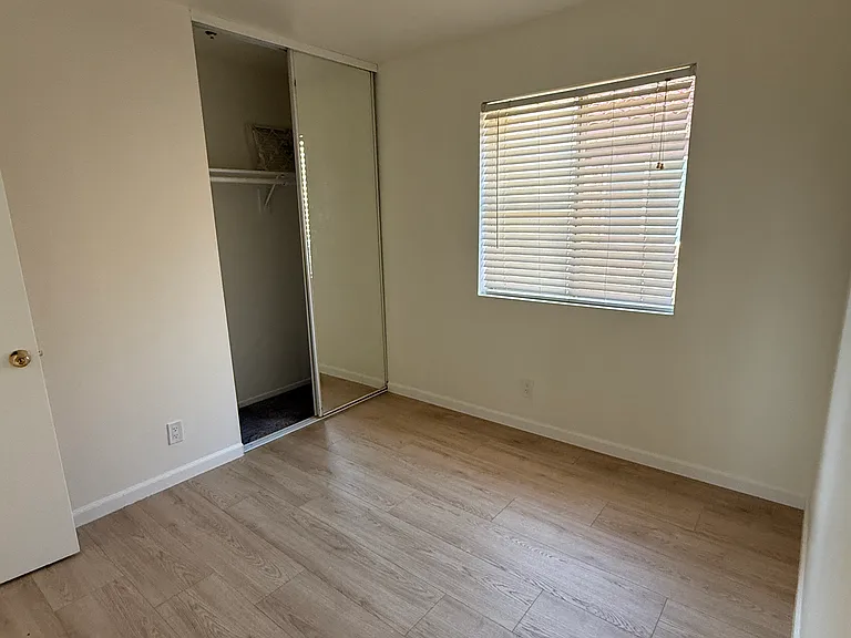 Bedroom 2 closet (sliding doors)