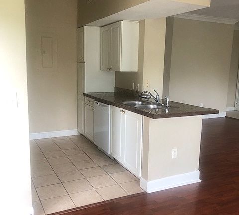 Looking at the kitchen from the dining area