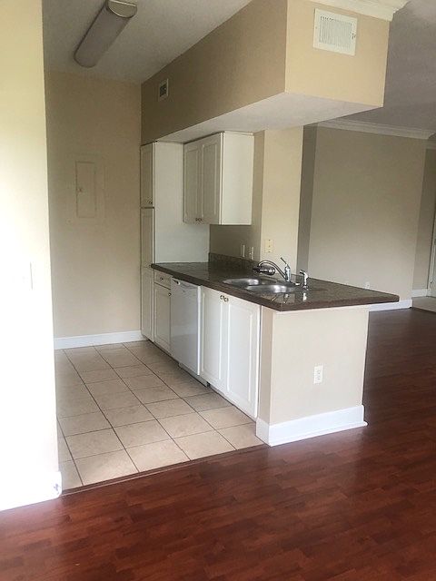 Looking at the kitchen from the dining area