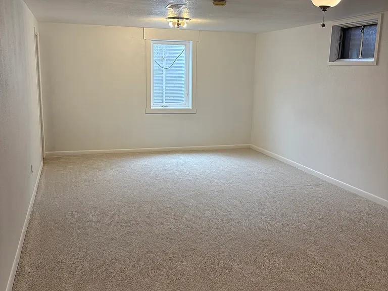 Downstairs, huge 2nd Primary bedroom with private bathroom
