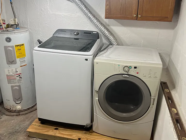 Water heater, washer & dryer; small storage space also