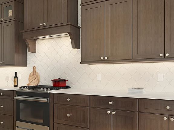Kitchen with decorative tile backsplash