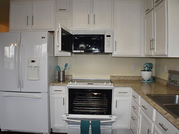 42" tall white cabinets Glass top and convection oven
