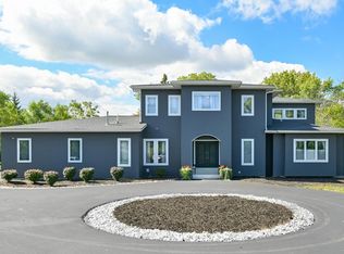 8825 N Spruce Rd, River Hills, WI 53217