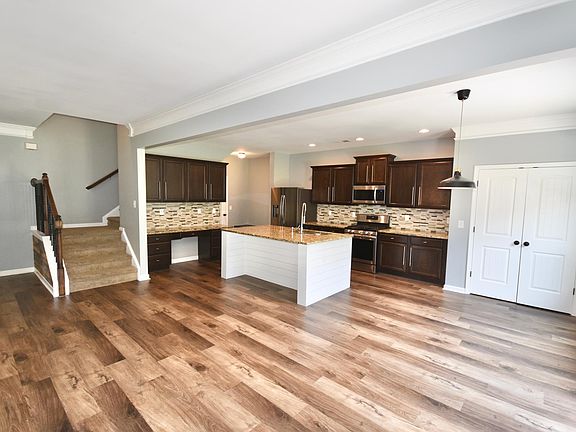 Large pantry, kitchen island & desk area