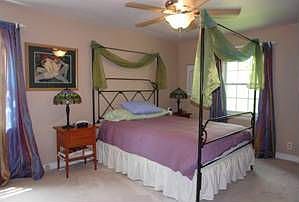 Romantic private br w/ his & hers closets