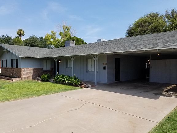 2 car covered Carport with driveway for additional vehicles