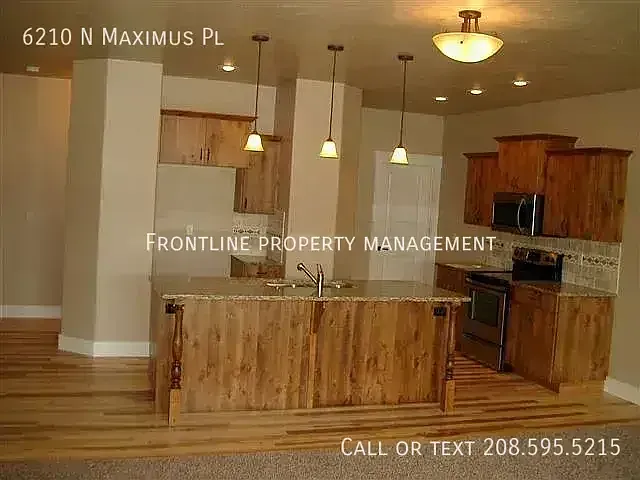 6210 N Maximus Pl — Photo 2