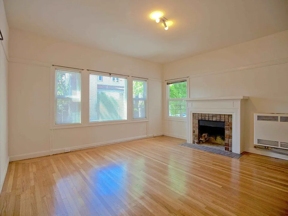 Beautiful, spacious 1-bdr with new windows, great wood floors, and lots of storage space