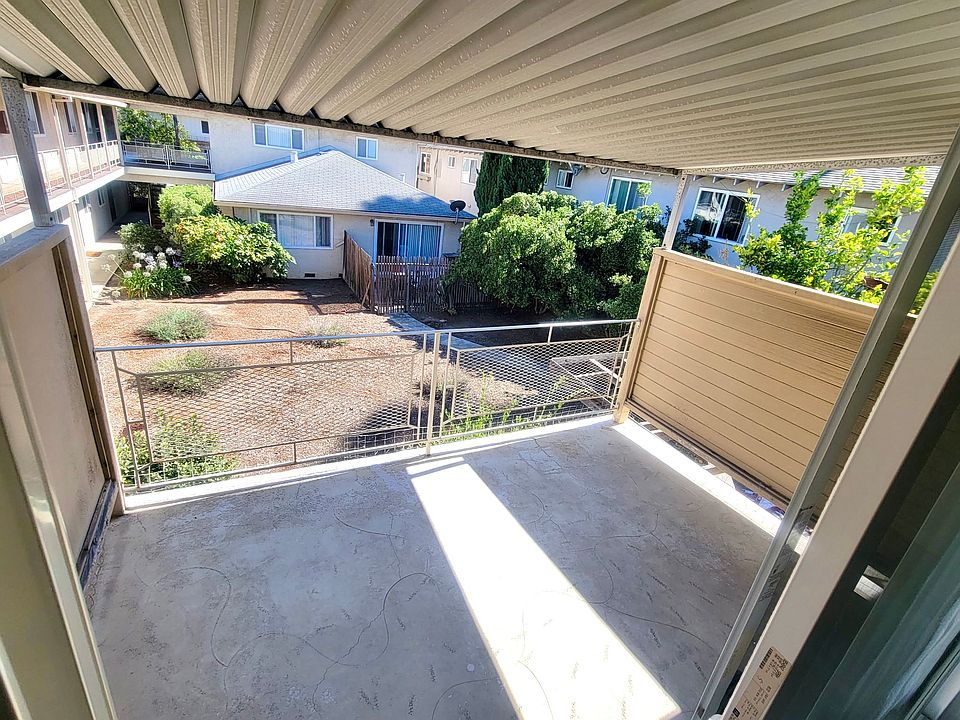 Large balcony overlooking quiet courtyard. Large sliding doors.
