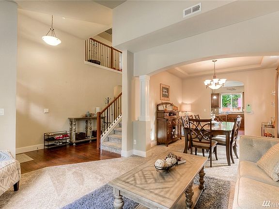 Living Room goes into the formal Dining RM