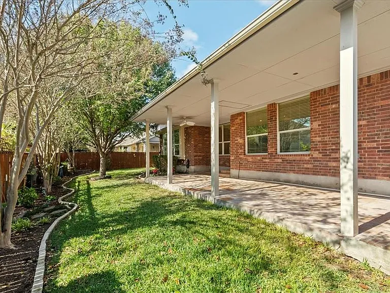Beautiful back yard with an expansive covered patio