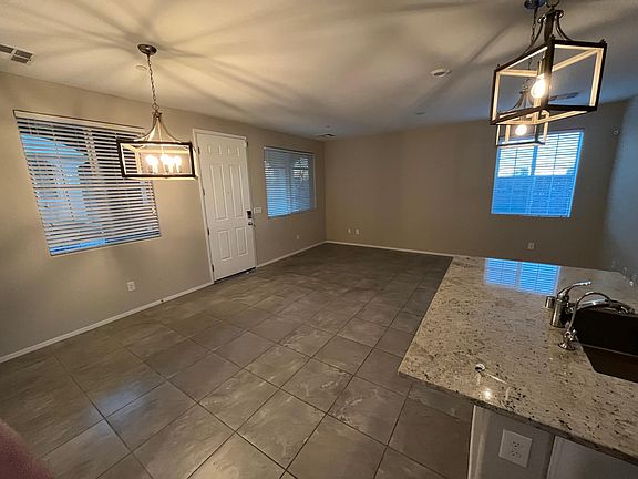 2nd image of 8466 Classique Ave Unit 105