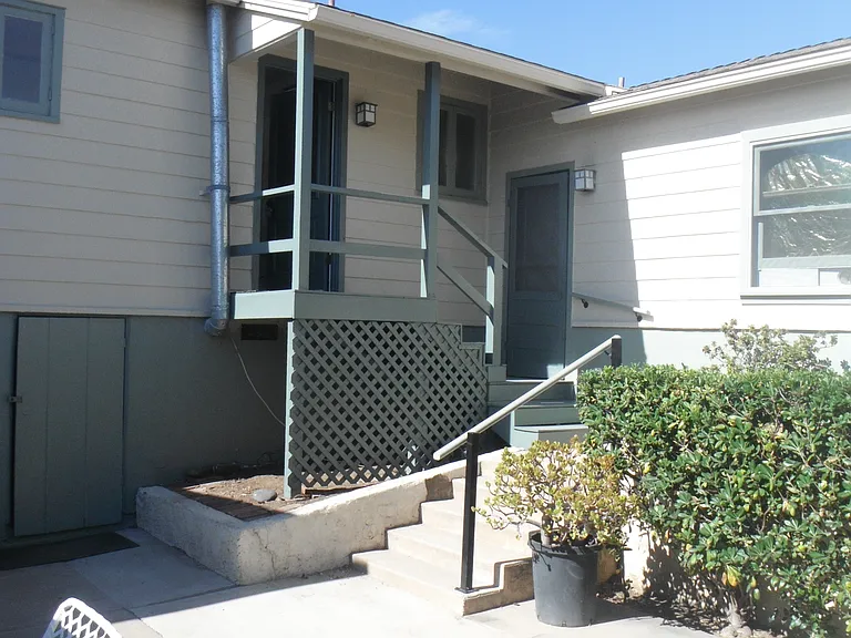 Back door off common area patio