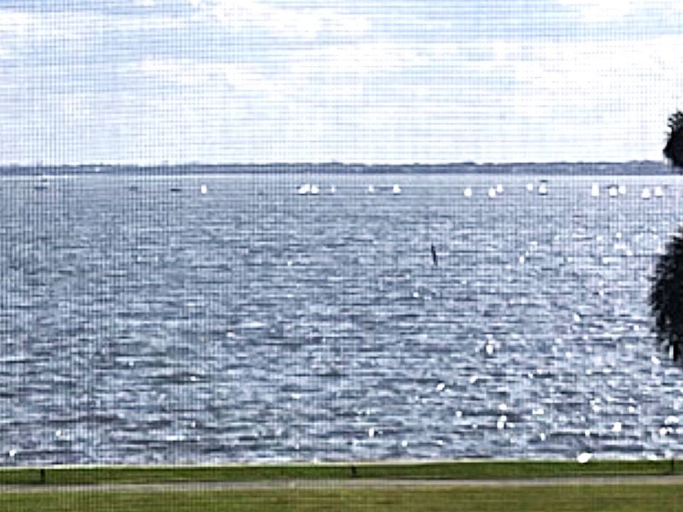 Enjoy The Sail Boats Cruising By On Sunday's As You Relax Having Lunch On Your Balcony