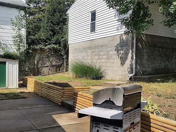 Patio deck off kitchen, and large detached garage.