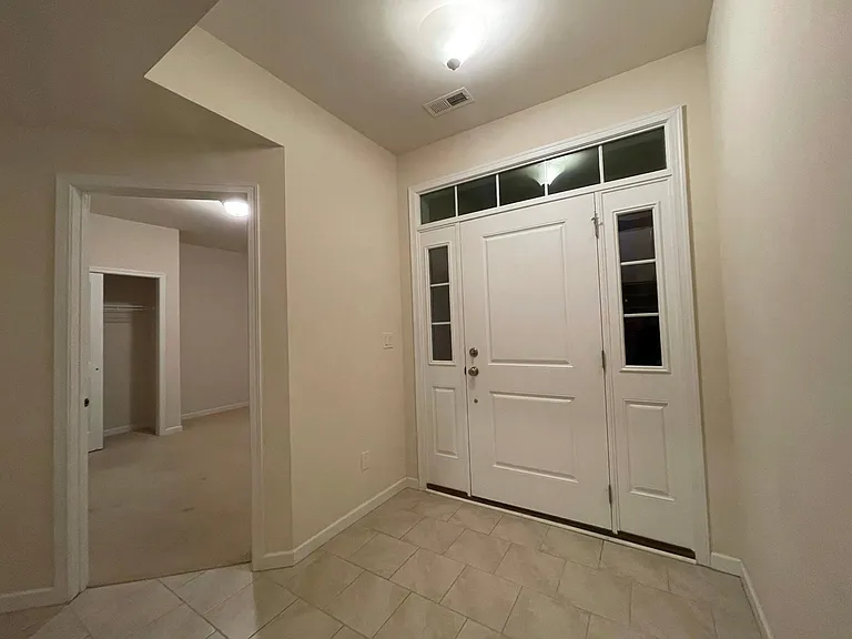 Entrance and 4th bedroom on the entry level