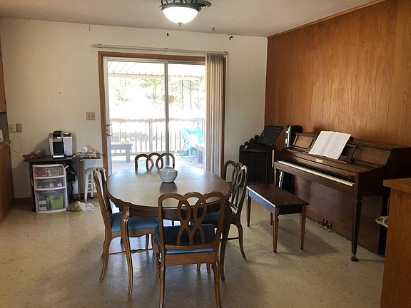 Dining room looking from living room towards the deck and backyard.